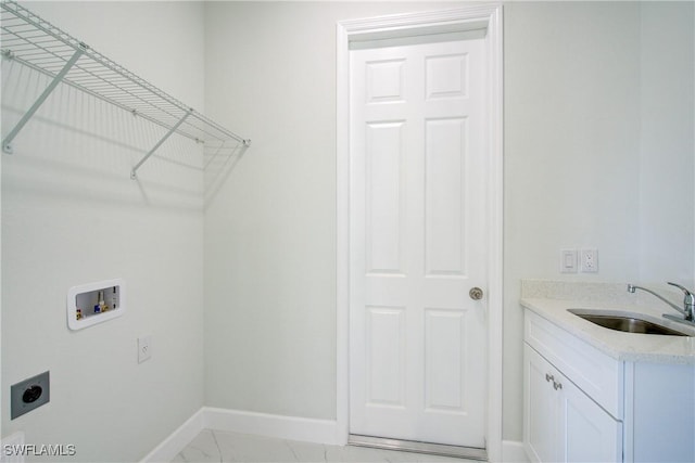 laundry area with washer hookup, sink, cabinets, and hookup for an electric dryer