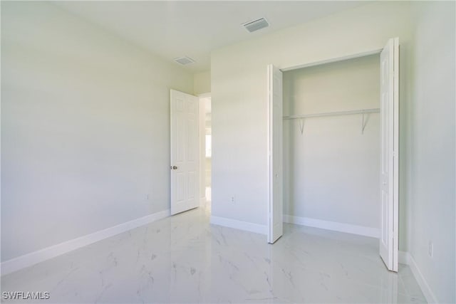 unfurnished bedroom featuring a closet