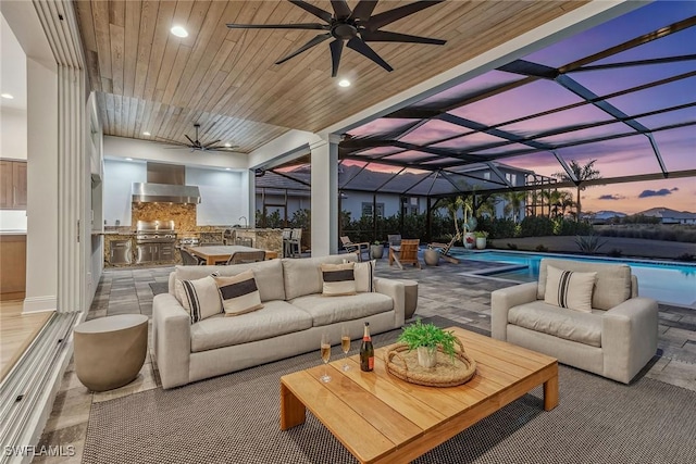 interior space with wooden ceiling, a sunroom, ceiling fan, and recessed lighting