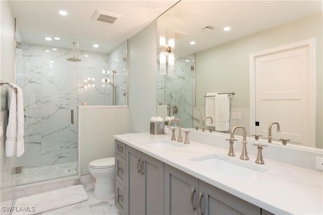 full bath featuring marble finish floor, a marble finish shower, visible vents, and a sink