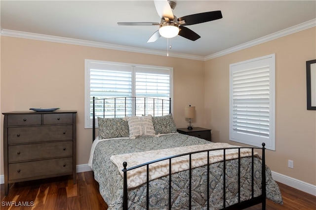 bedroom featuring crown molding, baseboards, and dark wood-type flooring