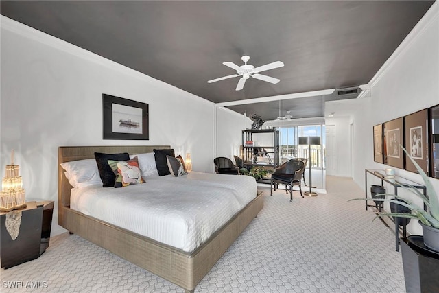 bedroom with ornamental molding, light carpet, and ceiling fan