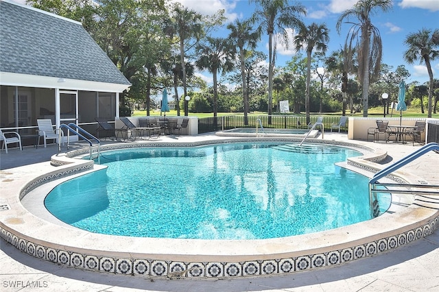 4 Park Lane Cir, Lehigh Acres, FL 33936 - community pool featuring a patio area