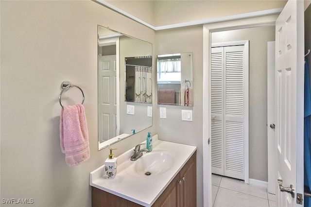 full bath featuring tile patterned floors and vanity