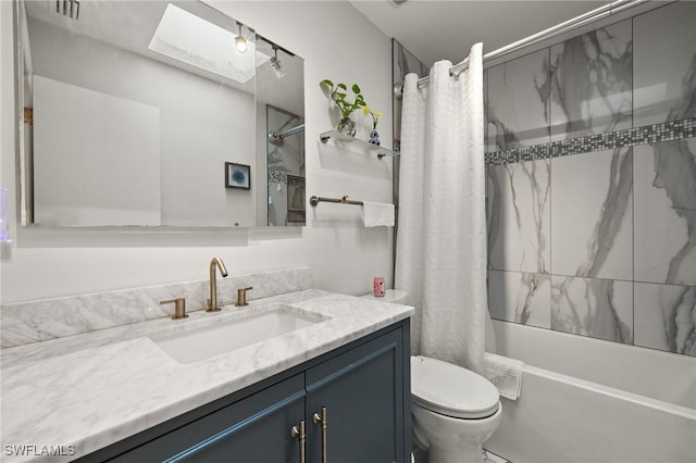 4071 E River Dr, Fort Myers, FL 33916 - full bathroom featuring toilet, a skylight, shower / bath combo with shower curtain, and vanity