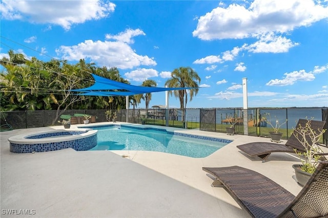 4071 E River Dr, Fort Myers, FL 33916 - view of swimming pool featuring an in ground hot tub, a water view, and a patio