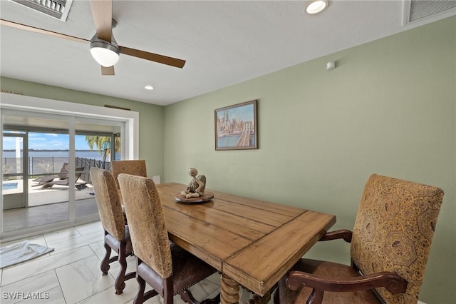 4071 E River Dr, Fort Myers, FL 33916 - dining area featuring ceiling fan