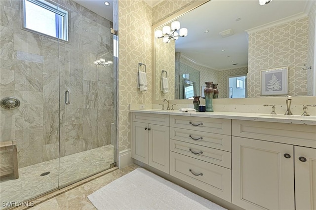 full bath with wallpapered walls, crown molding, and a sink