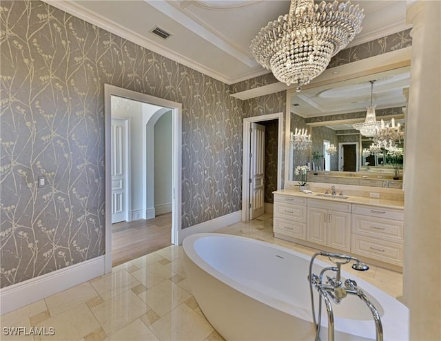 full bathroom featuring vanity, visible vents, wallpapered walls, an inviting chandelier, and a washtub