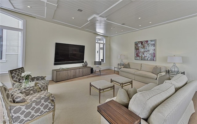 living room featuring recessed lighting and baseboards