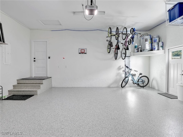 garage with a garage door opener and bike storage