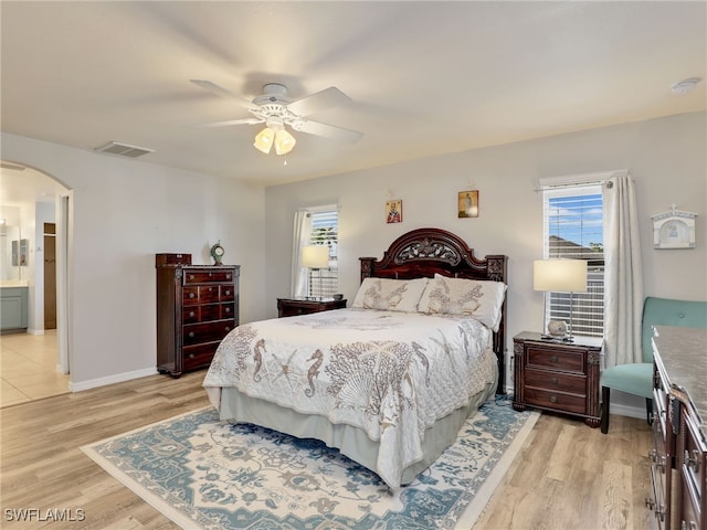 bedroom featuring ceiling fan and light hardwood / wood-style flooring