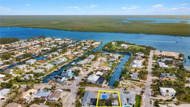 aerial view with a water view and a residential view