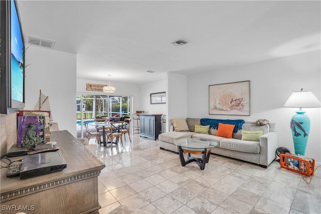 living room featuring visible vents