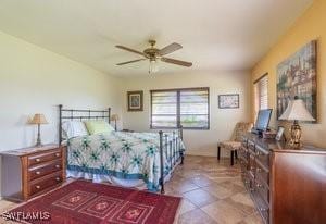 595 103rd Ave, Naples, FL 34108 - view of tiled bedroom