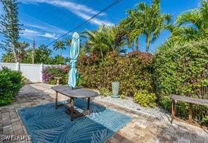 595 103rd Ave, Naples, FL 34108 - view of patio / terrace featuring fence private yard