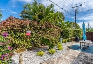 595 103rd Ave, Naples, FL 34108 - view of patio with fence