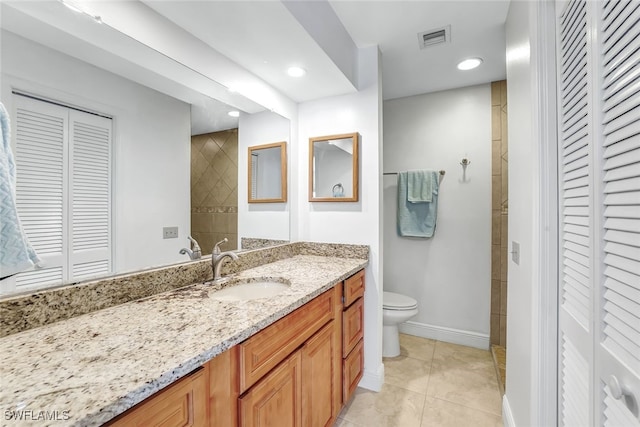 full bath with toilet, visible vents, a closet, and tile patterned floors