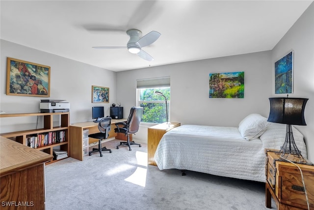 bedroom with carpet floors and a ceiling fan