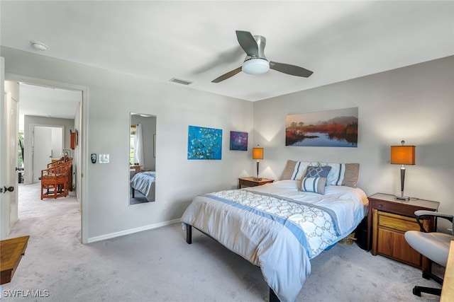 bedroom featuring visible vents, ceiling fan, light carpet, and baseboards