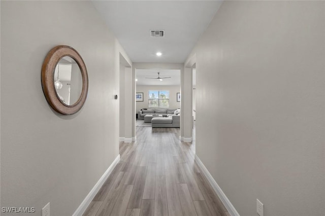 hall featuring light wood-type flooring