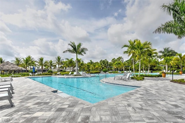 pool with a patio