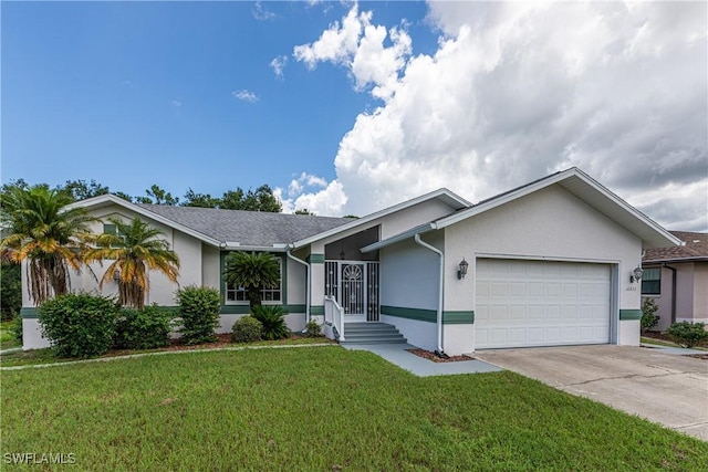 ranch-style home with a garage and a front lawn