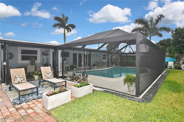 outdoor pool featuring glass enclosure, a patio, and a yard