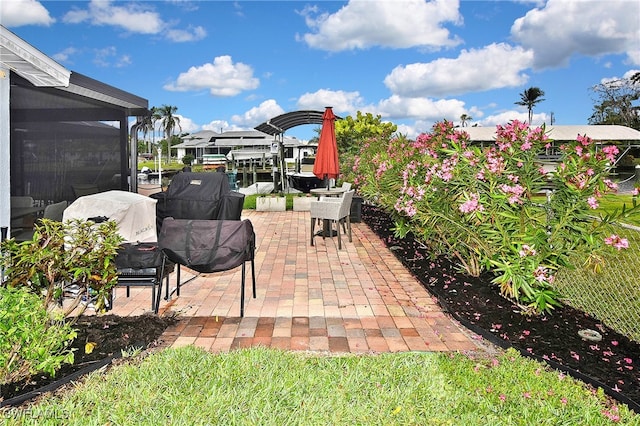 view of patio / terrace featuring a dock