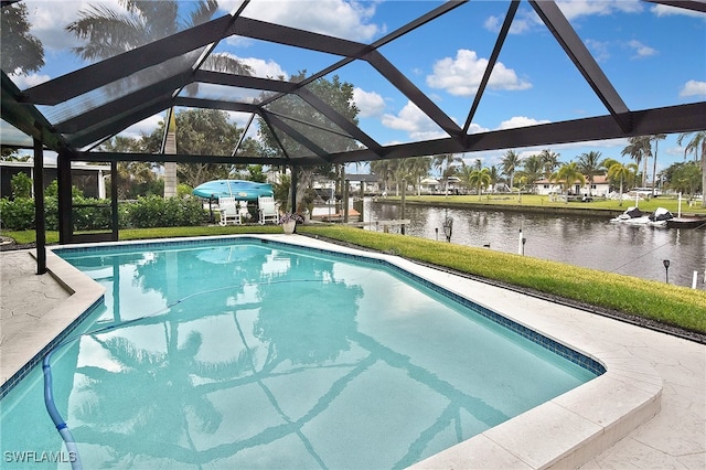 outdoor pool with a water view, a lawn, a lanai, and a patio area