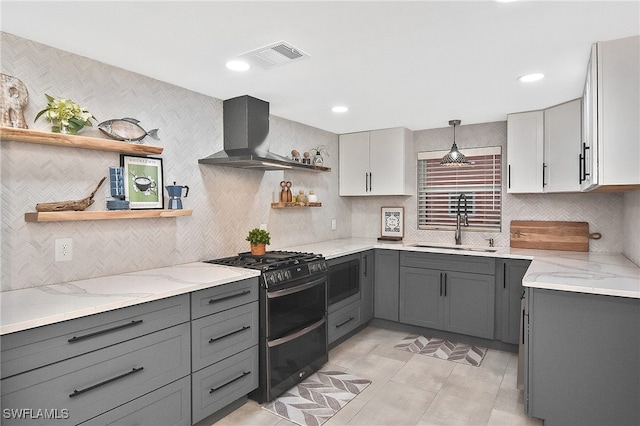 kitchen with open shelves and gray cabinets