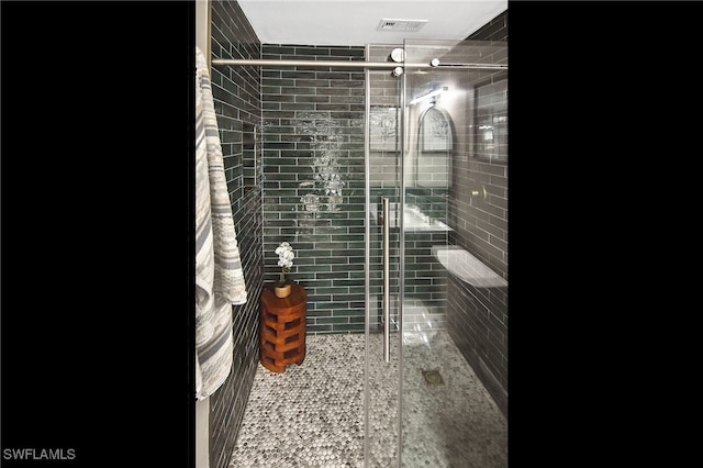 full bath featuring visible vents and a stall shower