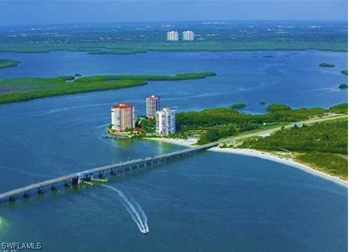 drone / aerial view with a water view