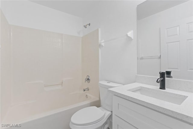 full bathroom featuring vanity, tub / shower combination, and toilet