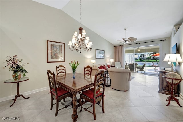 dining room featuring light tile patterned flooring, ceiling fan with notable chandelier, and high vaulted ceiling