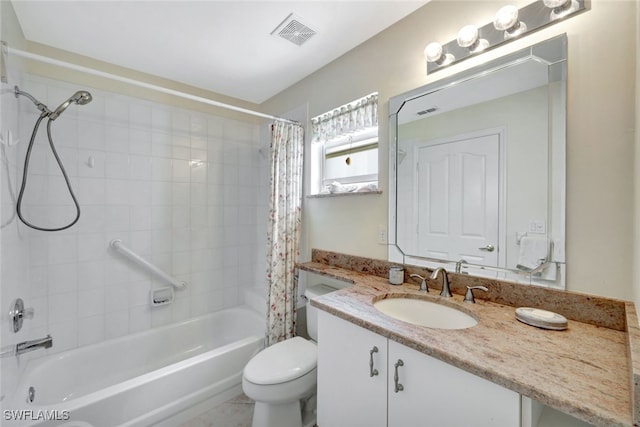 full bathroom with shower / tub combo with curtain, vanity, and toilet