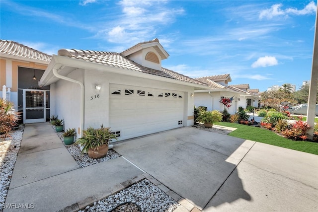 view of side of property with a garage