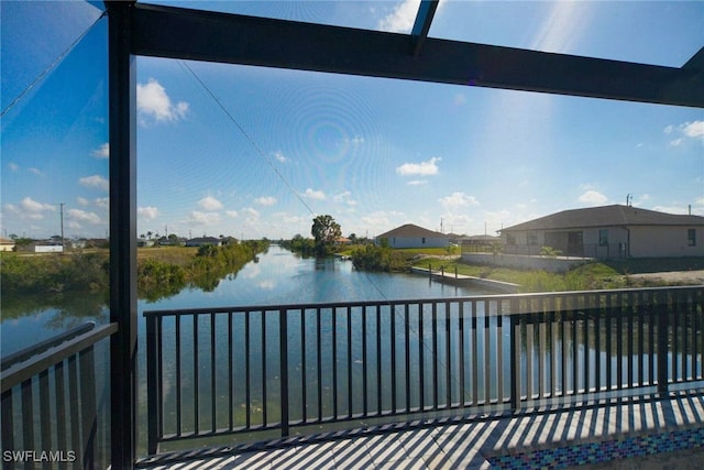 view of gate featuring a water view