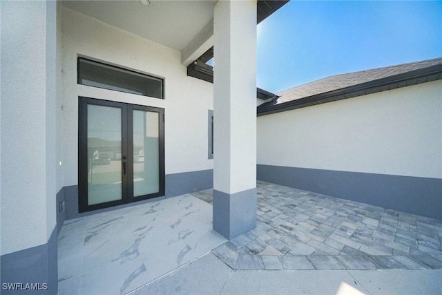 view of patio / terrace featuring french doors