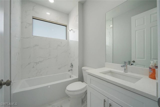 full bathroom featuring vanity, toilet, and tiled shower / bath combo