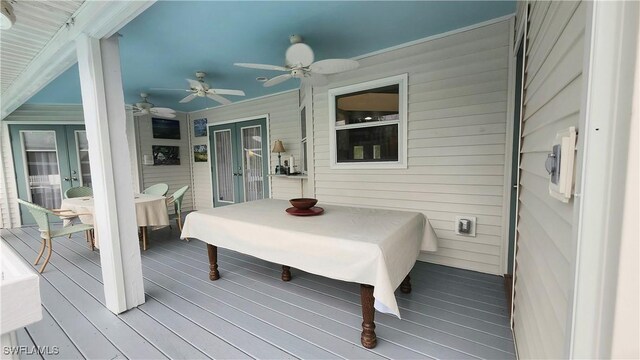 10800 Habitat Cir, Bokeelia, FL 33922 - wooden terrace featuring french doors and a ceiling fan