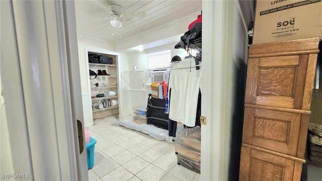 10800 Habitat Cir, Bokeelia, FL 33922 - walk in closet with light tile patterned flooring, a ceiling fan, and cooling unit