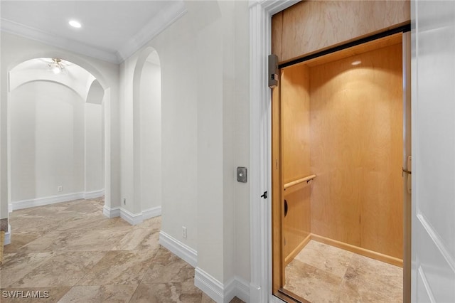 corridor with arched walkways, recessed lighting, baseboards, and crown molding