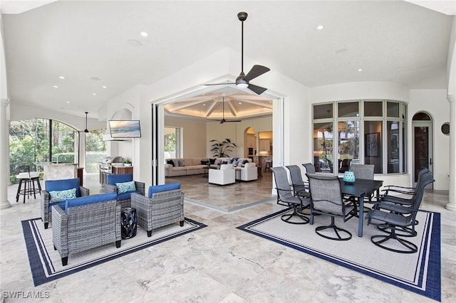 view of patio with outdoor dining space, an outdoor living space, and a ceiling fan