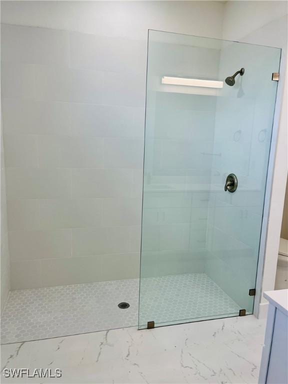 bathroom featuring vanity and an enclosed shower