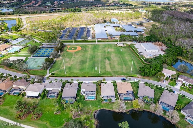 drone / aerial view with a water view