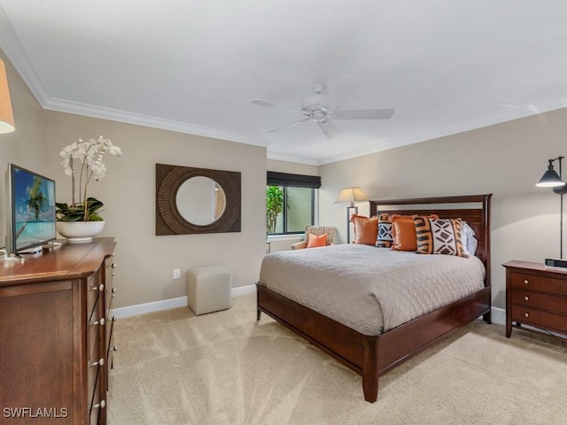 bedroom with light carpet, ornamental molding, and ceiling fan