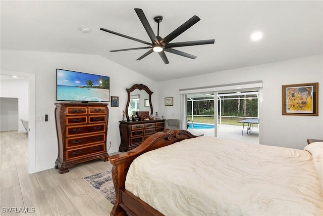bedroom featuring light wood-style floors, access to exterior, lofted ceiling, and ceiling fan