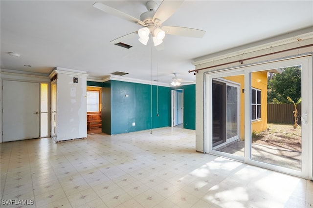 spare room with crown molding and ceiling fan