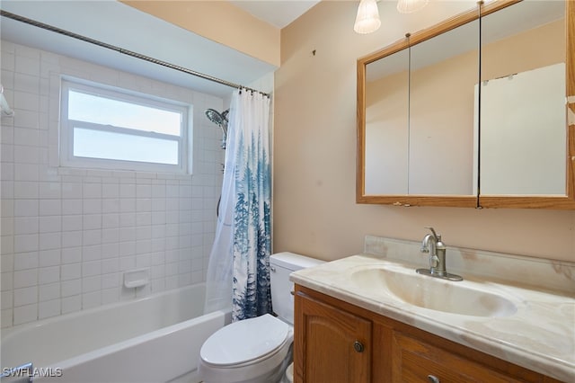 full bathroom featuring shower / bathtub combination with curtain, vanity, and toilet